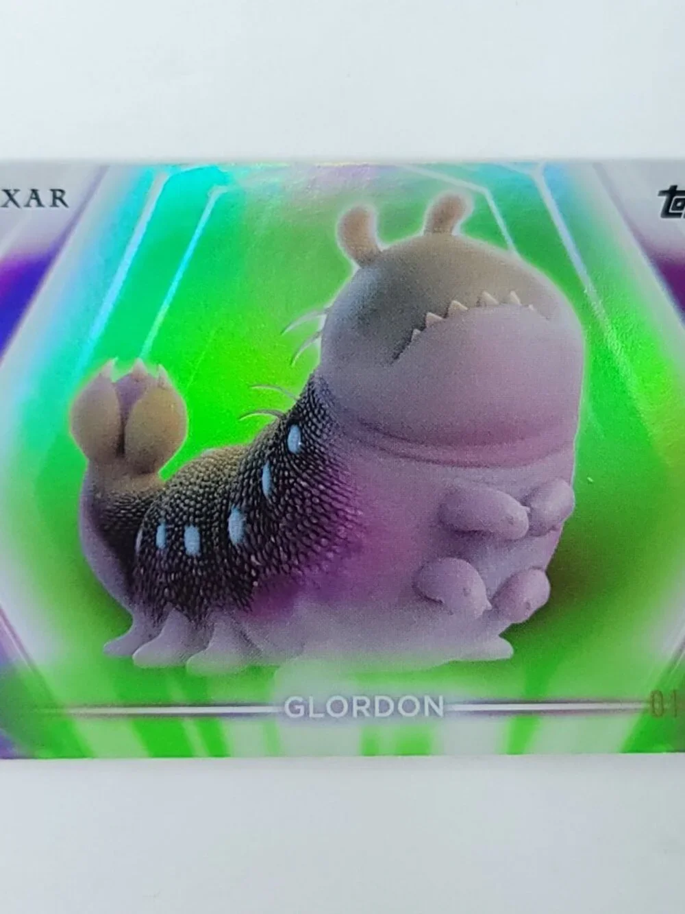 Glordon Topps 2026 Disney Neon Holo Parallel Refractor Limited 014/199 - Picture 1 of 4